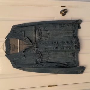 Saddlebred, heavy jean coat. Button front, pocket and cuff.